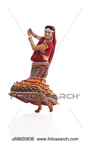 Female dandiya dancer dancing View Large Photo Image Stock Photograph - Female dandiya dancer dancing . Fotosearch