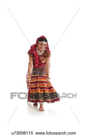 Female dandiya dancer dancing View Large Photo Image Stock Photography - Female dandiya dancer dancing . Fotosearch
