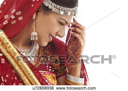 Female dandiya dancer with sticks View Large Photo Image Stock Photo - Female dandiya dancer with sticks . Fotosearch