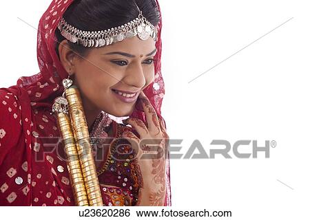 Female dandiya dancer with sticks View Large Photo Image Stock Photograph - Female dandiya dancer with sticks . Fotosearch