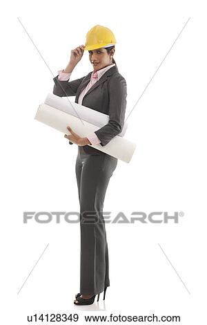 Stock Photo - Female engineer with blueprints . Fotosearch