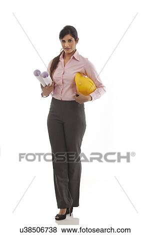 Stock Photo - Female engineer with blueprints . Fotosearch