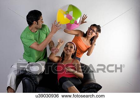Friends enjoying View Large Photo Image Stock Photograph - Friends enjoying . Fotosearch