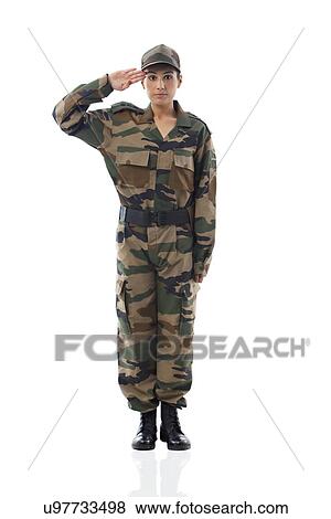 Stock Photo - Full length of female soldier saluting . Fotosearch