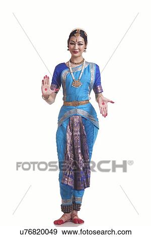 Full length portrait of woman in Bharatanatyam posture over white background View Large Photo Image Stock Photo - Full length portrait of woman in Bharatanatyam posture over white background. Fotosearch