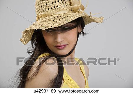 Stock Photo - Girl in a hat . Fotosearch