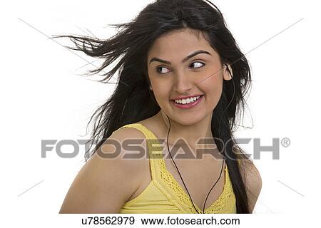 Girl listening to music View Large Photo Image Stock Photo - Girl listening to music . Fotosearch