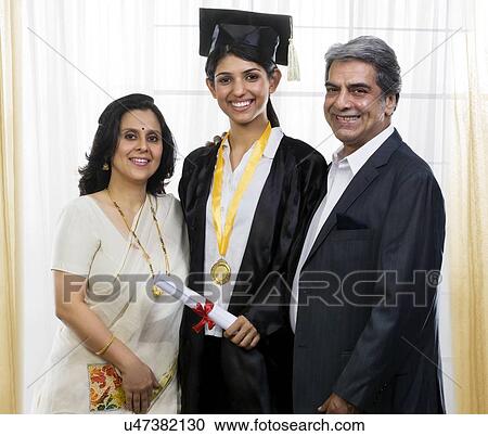 Girl posing with her parents View Large Photo Image Stock Image - Girl posing with her parents . Fotosearch