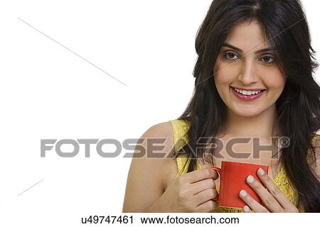 Girl with a cup of coffee View Large Photo Image Stock Image - Girl with a cup of coffee . Fotosearch