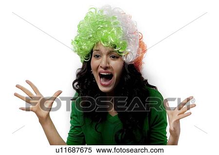 Girl with a wig cheering View Large Photo Image Stock Photography - Girl with a wig cheering . Fotosearch