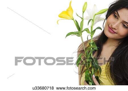 Stock Photo - Girl with flowers . Fotosearch