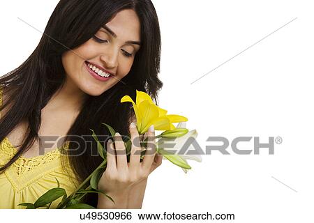 Girl with flowers View Large Photo Image Stock Photograph - Girl with flowers . Fotosearch