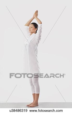 Girl with hands joined above head View Large Photo Image Stock Photo - Girl with hands joined above head . Fotosearch