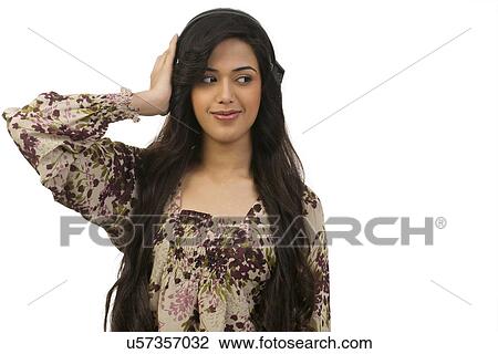 Girl with headphones View Large Photo Image Stock Image - Girl with headphones . Fotosearch