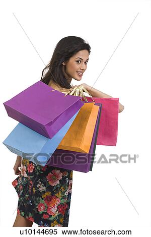 Girl with shopping bags View Large Photo Image Stock Photography - Girl with shopping bags . Fotosearch