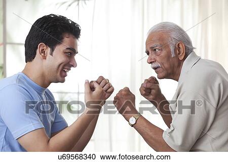 Grandfather boxing with grandson View Large Photo Image Stock Image - Grandfather boxing with grandson. Fotosearch
