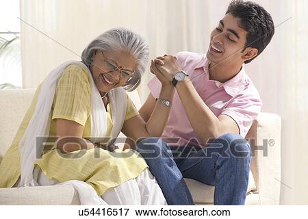 Grandmother and grandson in a playful mood View Large Photo Image Stock Photo - Grandmother and grandson in a playful mood. Fotosearch