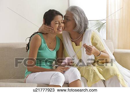 Grandmother teaching granddaughter how to knit View Large Photo Image Stock Image - Grandmother teaching granddaughter how to knit. Fotosearch