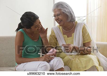 Grandmother teaching granddaughter how to knit View Large Photo Image Stock Image - Grandmother teaching granddaughter how to knit. Fotosearch