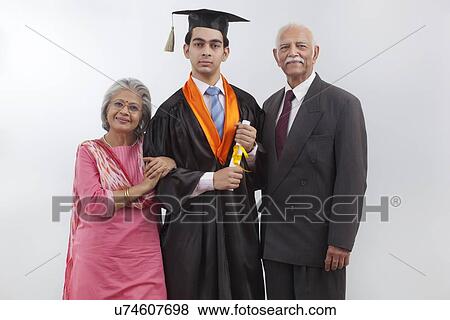 Stock Photo - Grandparents at grandson's graduation ceremony. Fotosearch