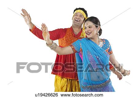 Gujarati couple dancing View Large Photo Image Stock Photograph - Gujarati couple dancing . Fotosearch
