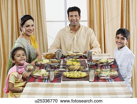 Gujarati family having lunch View Large Photo Image Stock Image - Gujarati family having lunch . Fotosearch