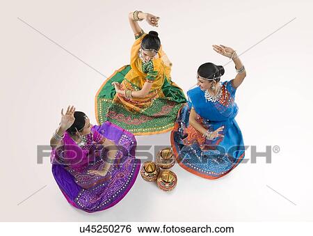 Gujarati women dancing View Large Photo Image Stock Photograph - Gujarati women dancing . Fotosearch