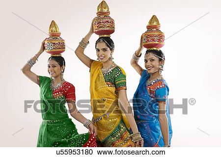 Gujarati women holding a kalash View Large Photo Image Stock Image - Gujarati women holding a kalash . Fotosearch