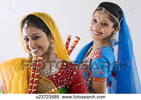 Gujarati women with dandiya sticks View Large Photo Image Stock Photography - Gujarati women with dandiya sticks . Fotosearch