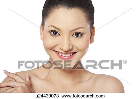 Stock Image - Happy young woman over white background . Fotosearch