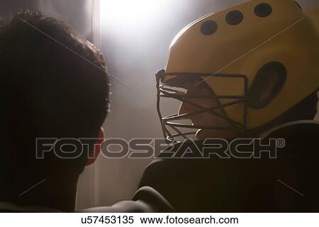 Hockey players standing together View Large Photo Image Stock Photography - Hockey players standing together . Fotosearch