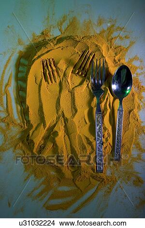 Impressions on turmeric powder View Large Photo Image Picture - Impressions on turmeric powder . Fotosearch