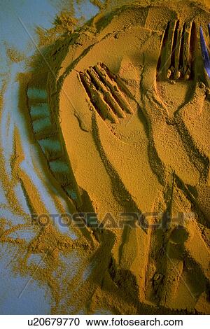 Impressions on turmeric powder View Large Photo Image Stock Image - Impressions on turmeric powder . Fotosearch