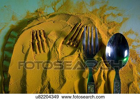 Stock Photo - Impressions on turmeric powder . Fotosearch