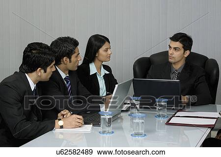 In a meeting View Large Photo Image Stock Photo - In a meeting . Fotosearch