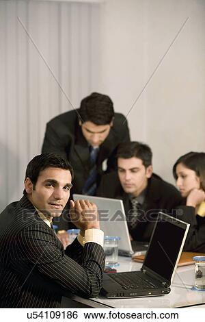 In a meeting View Large Photo Image Stock Photograph - In a meeting . Fotosearch
