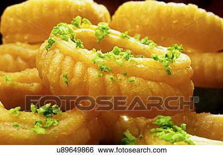 Indian sweets View Large Photo Image Stock Photograph - Indian sweets . Fotosearch