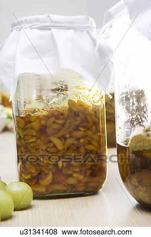 Jar filled with garlic pickle View Large Photo Image Stock Photo - Jar filled with garlic pickle . Fotosearch
