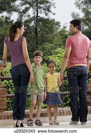 Kids with their parents View Large Photo Image Stock Image - Kids with their parents . Fotosearch