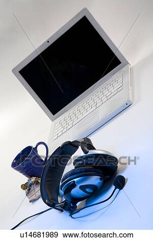 Laptop with headphones View Large Photo Image Stock Photo - Laptop with headphones . Fotosearch