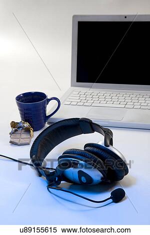 Laptop with headphones View Large Photo Image Stock Photography - Laptop with headphones . Fotosearch