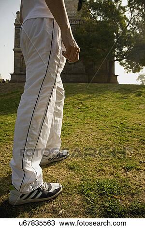 Stock Image - Legs of a man . Fotosearch