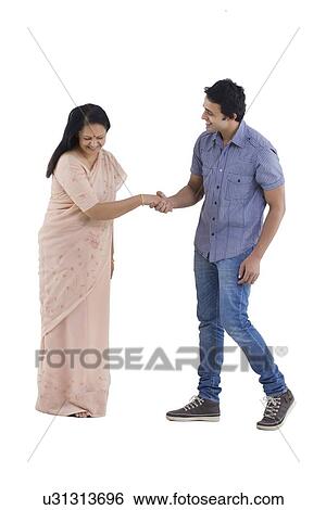 Man approaching mother to dance over white background View Large Photo Image Stock Photograph - Man approaching mother to dance over white background . Fotosearch
