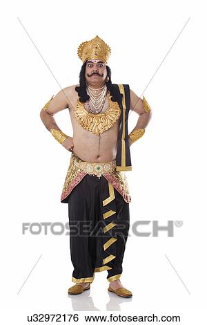 Man dressed as Raavan looking serious View Large Photo Image Stock Photograph - Man dressed as Raavan looking serious . Fotosearch