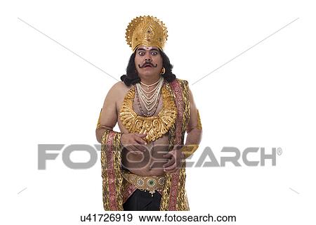 Man dressed as Raavan looking surprised View Large Photo Image Stock Photo - Man dressed as Raavan looking surprised . Fotosearch