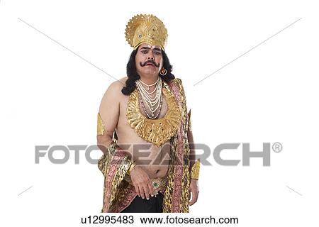 Man dressed as Raavan looking unhappy View Large Photo Image Stock Image - Man dressed as Raavan looking unhappy . Fotosearch