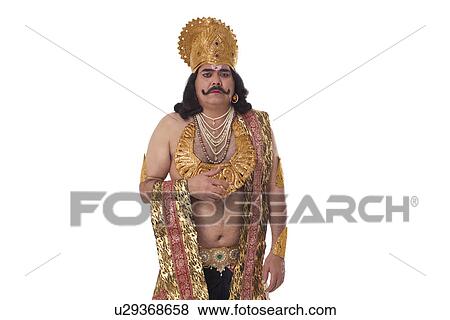 Man dressed as Raavan looking unhappy View Large Photo Image Stock Photo - Man dressed as Raavan looking unhappy . Fotosearch