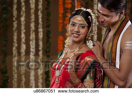 Man fastening wife's necklace View Large Photo Image Stock Image - Man fastening wife's necklace . Fotosearch