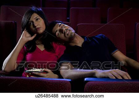 Man sleeping on his girlfriends shoulder View Large Photo Image Stock Photo - Man sleeping on his girlfriends shoulder . Fotosearch