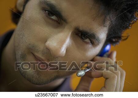 Man speaking on microphone View Large Photo Image Stock Photo - Man speaking on microphone . Fotosearch